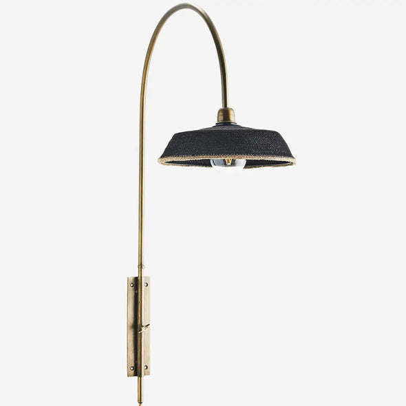 Madam Stoltz iron wall lamp with grass shade